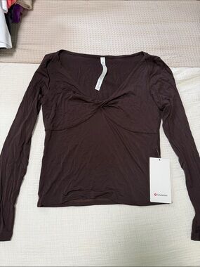 lululemon athletica Long-Sleeve Twist Front Top in Dark Brown